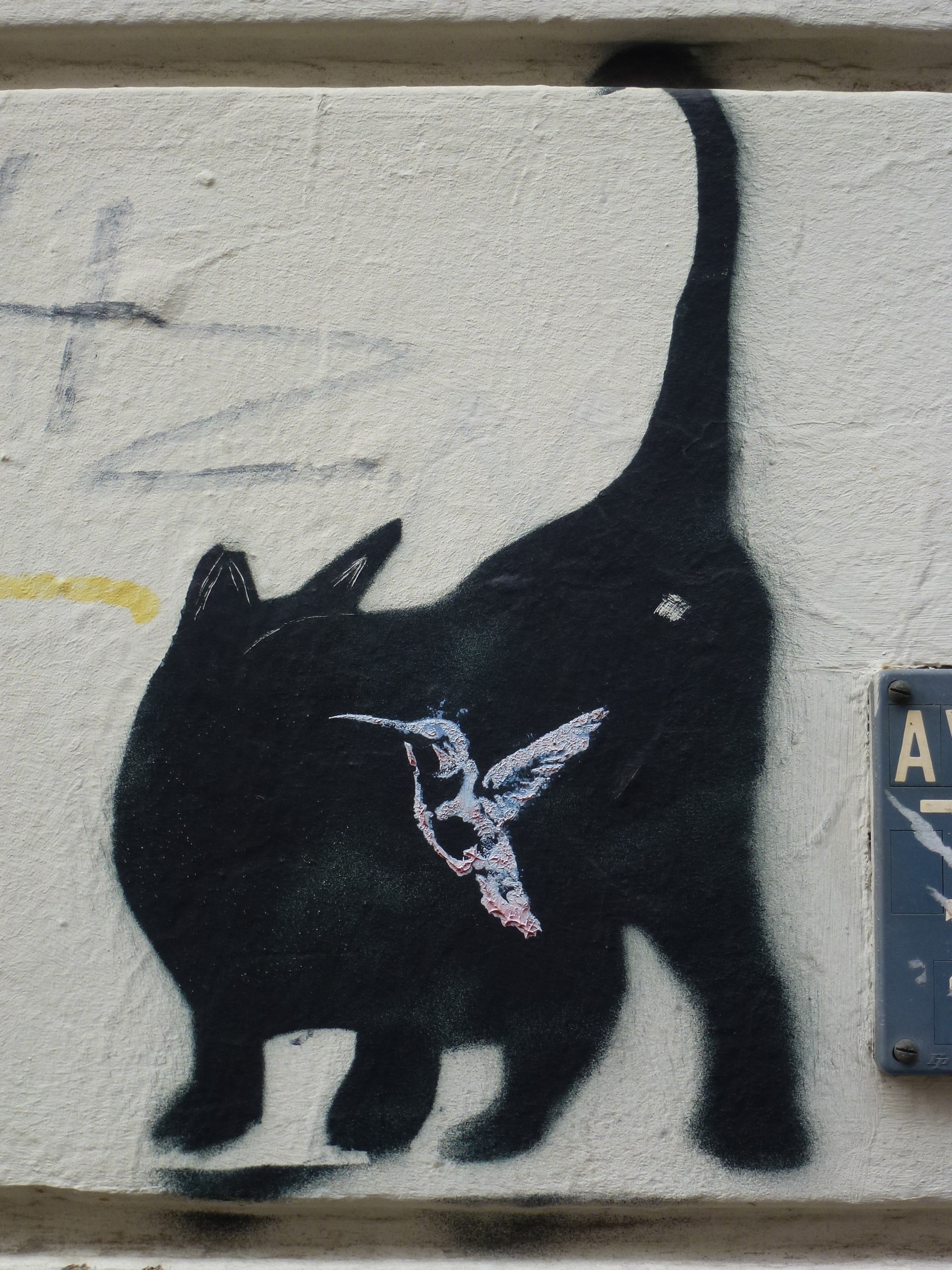 Stencil gegenüber der "Roten Flora": Katzen-Silhouette mit Kolibri